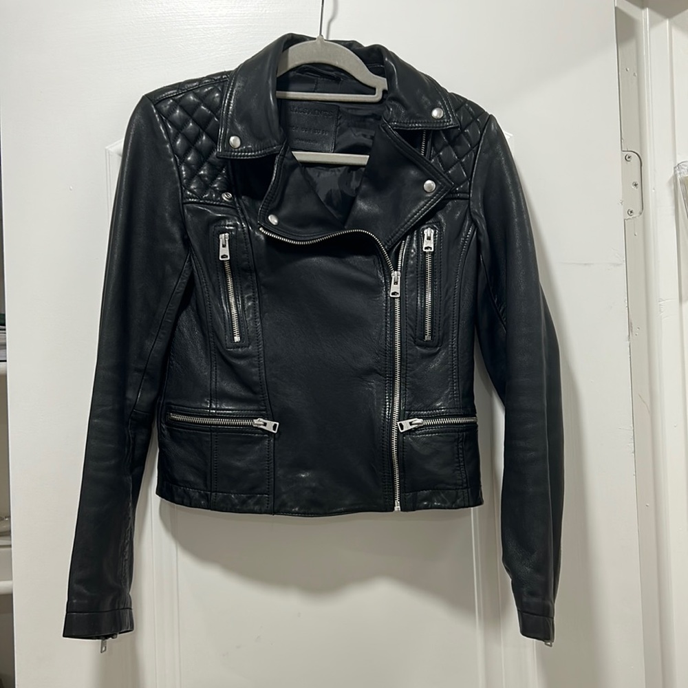 This is a black leather jacket from All Saints in great condition. Barely worn.